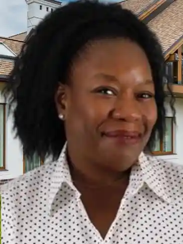 A woman with long hair wearing polka dots.